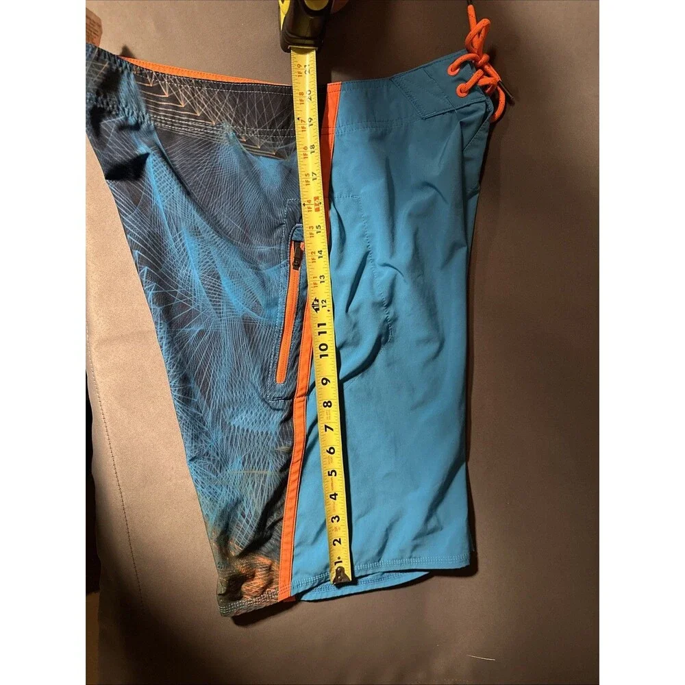 Oakley 32 Blue Board Shorts Zip Pocket Orange Regular Fit Swim Skull Y2K Print